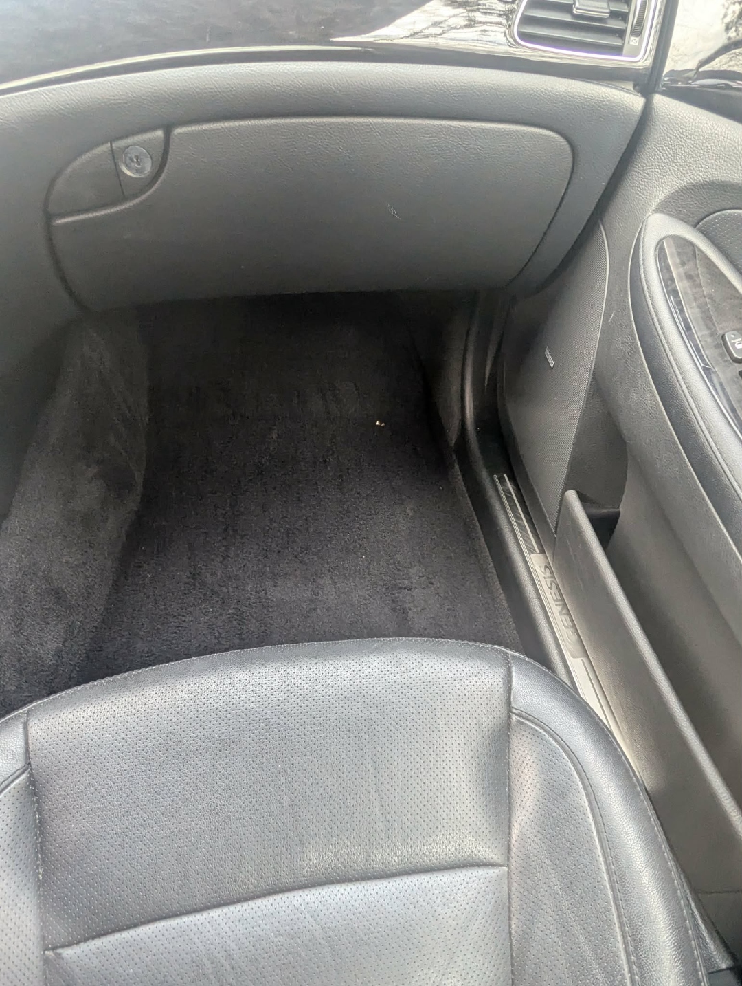 Hyundai Genesis — rear footwell clean carpet after interior detail