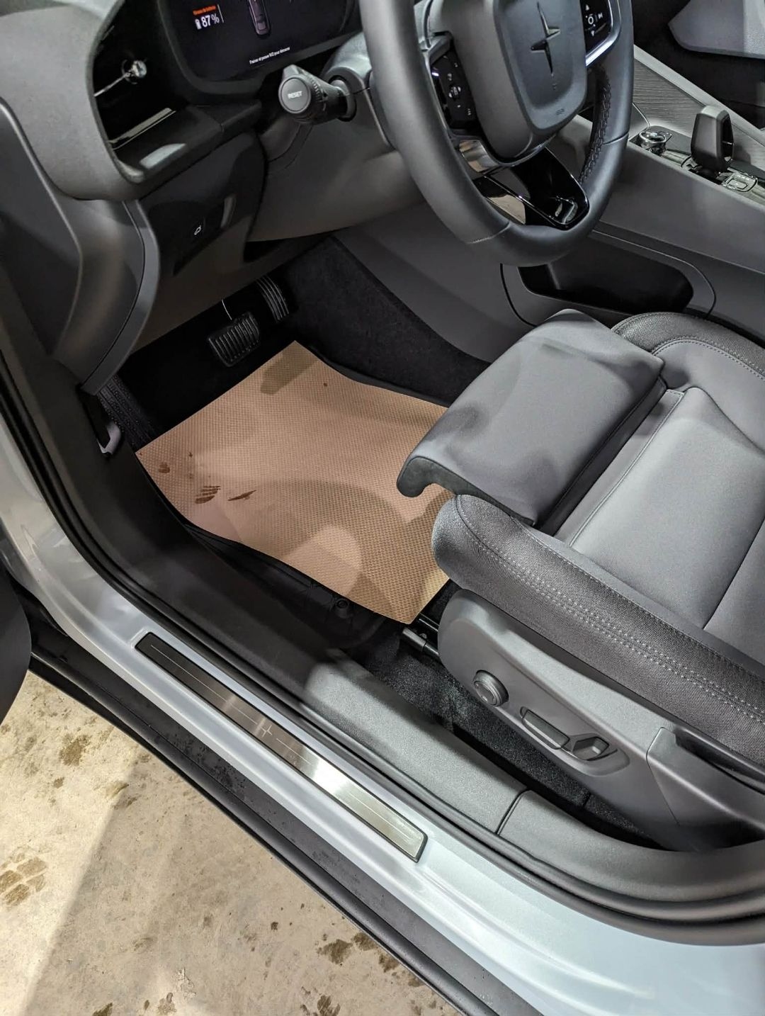 Polestar 2 White — driver side floor mat after interior detail