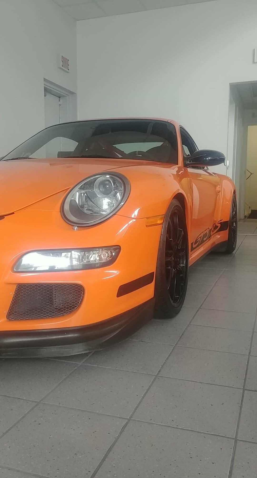 Porsche 911 GT3 RS orange — front 3/4 after exterior detail