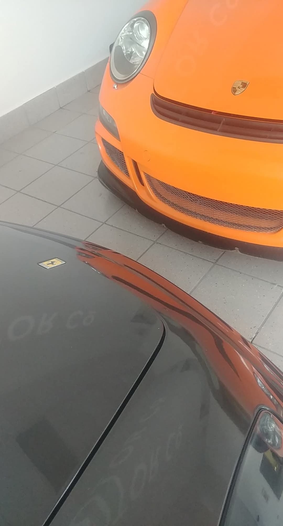 Porsche 911 GT3 RS — front with mirror-finish floor reflection after exterior detail