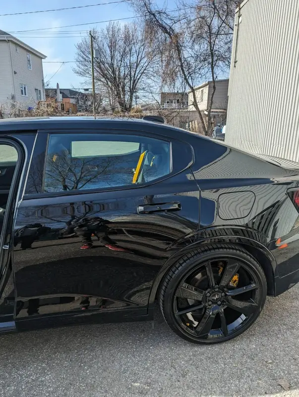 Polestar 2 Midnight — side glass panel reflection after detail