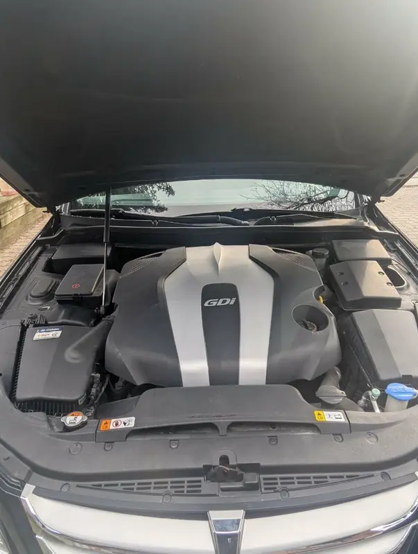 Hyundai Genesis — engine bay clean GDi label visible after full detail