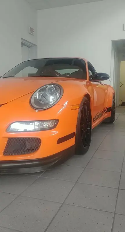 Porsche 911 GT3 RS orange — front 3/4 after exterior detail