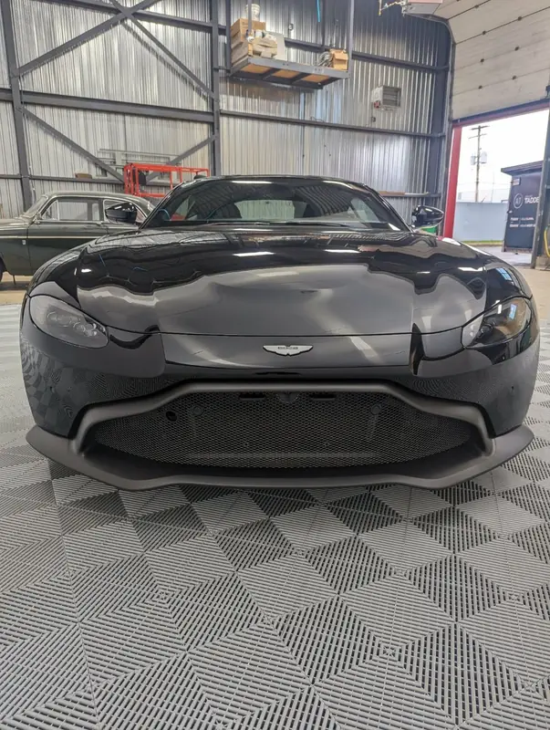 Aston Martin Vantage — front straight garage shot after full detail
