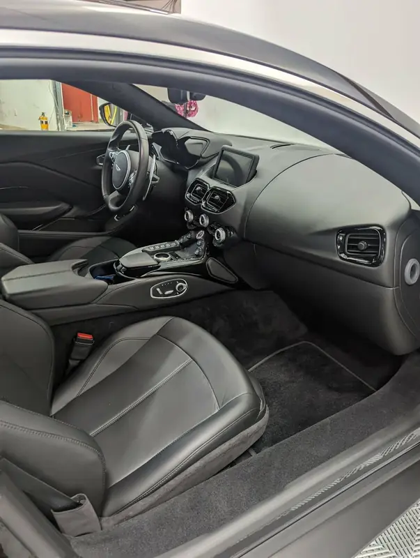Aston Martin Vantage — interior passenger cabin after full detail