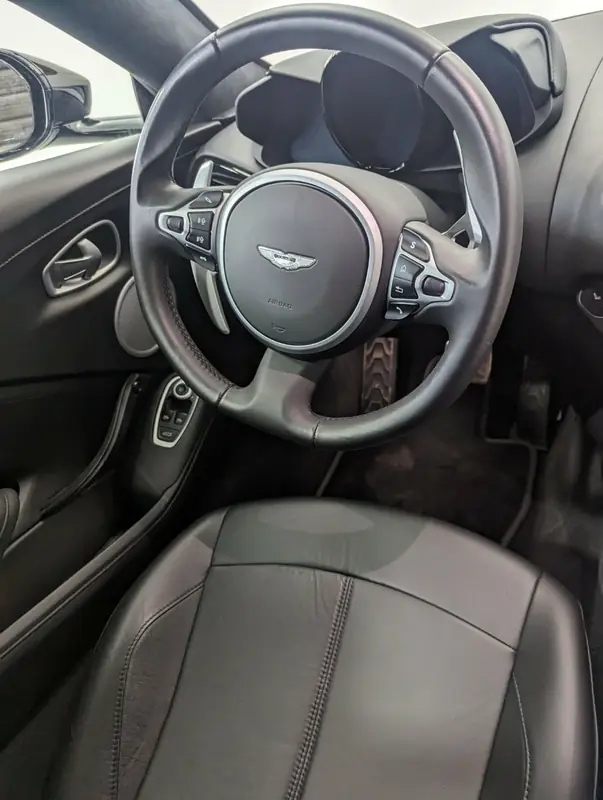 Aston Martin Vantage — steering wheel closeup after full detail