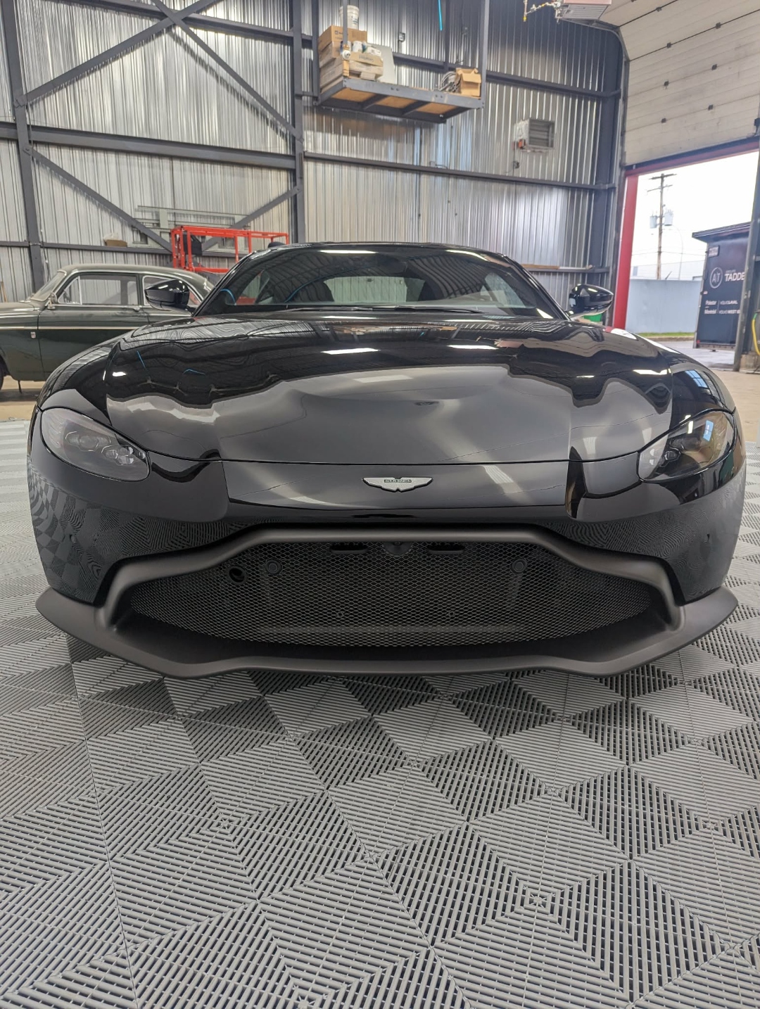 Aston Martin Vantage — front straight garage shot after full detail