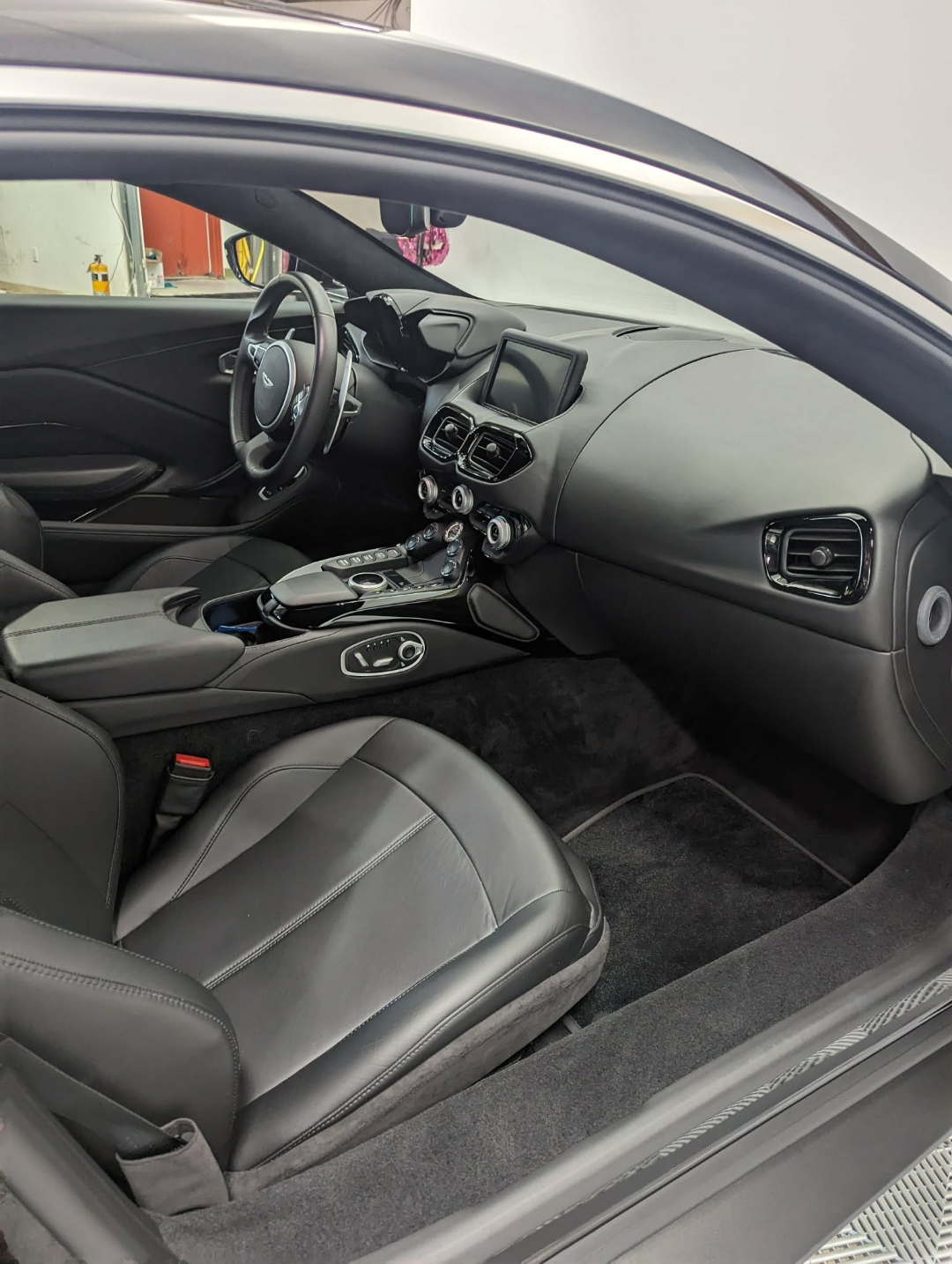 Aston Martin Vantage — interior passenger cabin after full detail