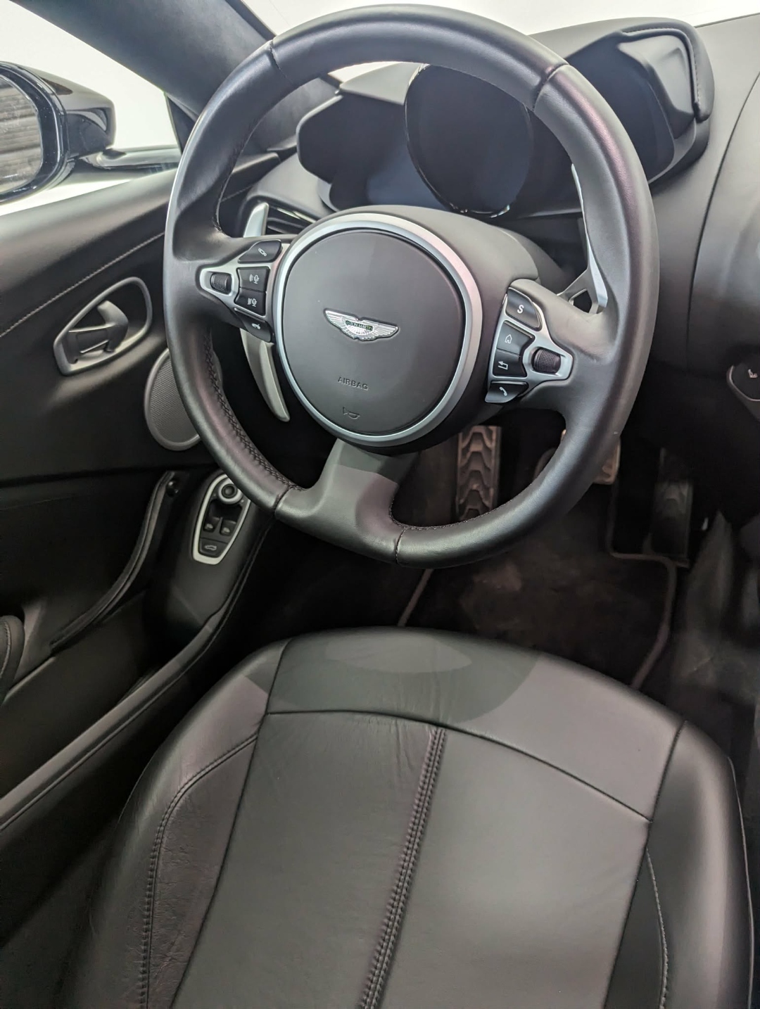 Aston Martin Vantage — steering wheel closeup after full detail